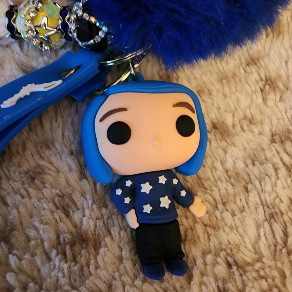 Coraline Blue Shirt Star Blue Pom Pom Key Holder with Character Charm Beaded